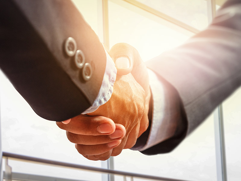 2-men-shaking-hands