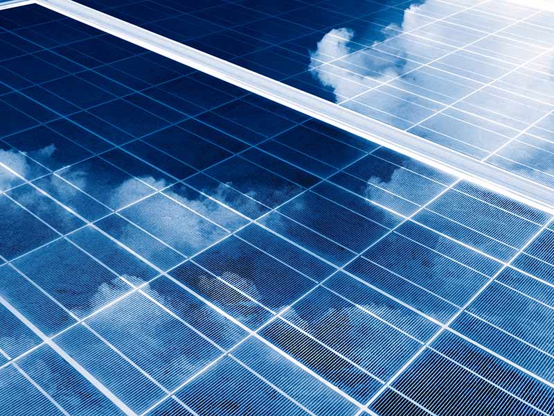 What is the real difference between brands of solar inverters? solar panel reflecting clouds