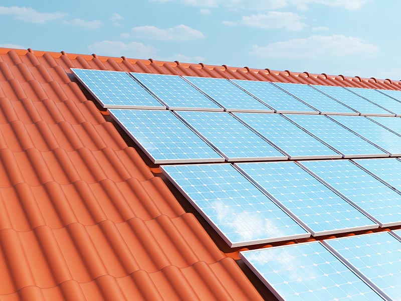 Close up of solar panels installed on roof close up solar panels on red roof