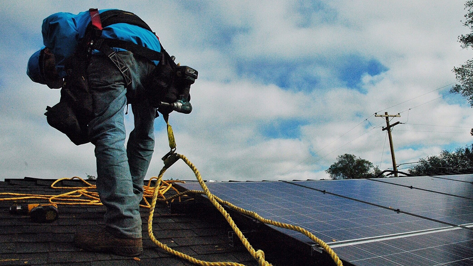 solar installer on a roof